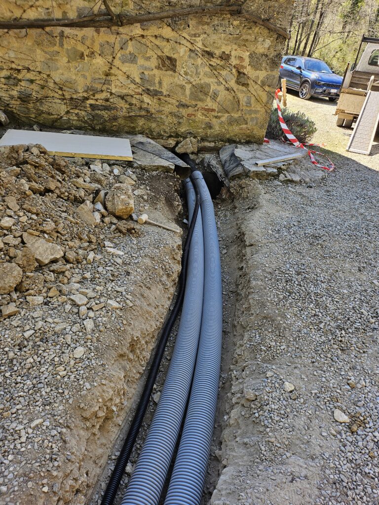 Heat pump pipes going into villa