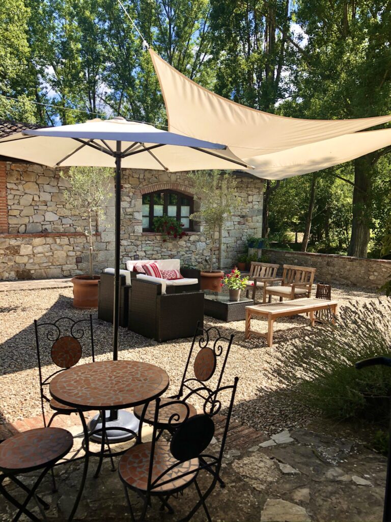 Courtyard with seating and shade covers.