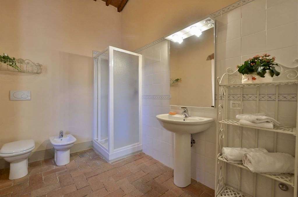 A view of the small bedroom ensuite bathroom.